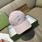 Gucci cap in pink and lavender with GG monogram print and curved brim