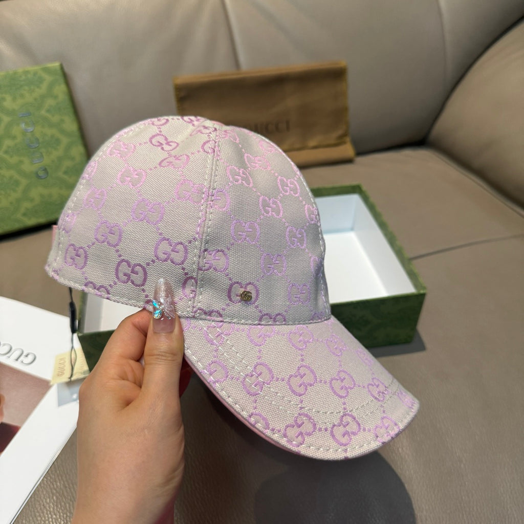 Gucci cap in lavender and pink GG monogram fabric, curved brim front view