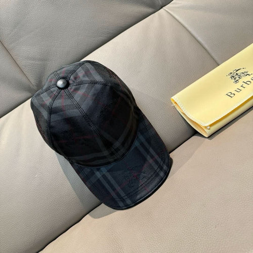 Plaid baseball cap, dark navy with red and gray check pattern and snap button top