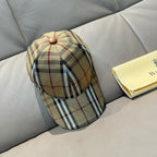 Plaid baseball cap with tan brim and dome top, side view