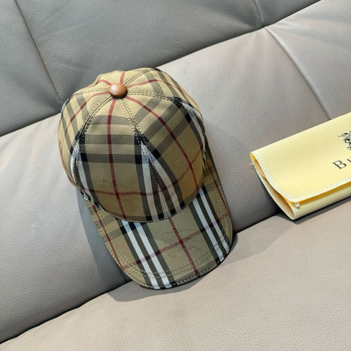 Plaid baseball cap with tan brim and dome top, side view
