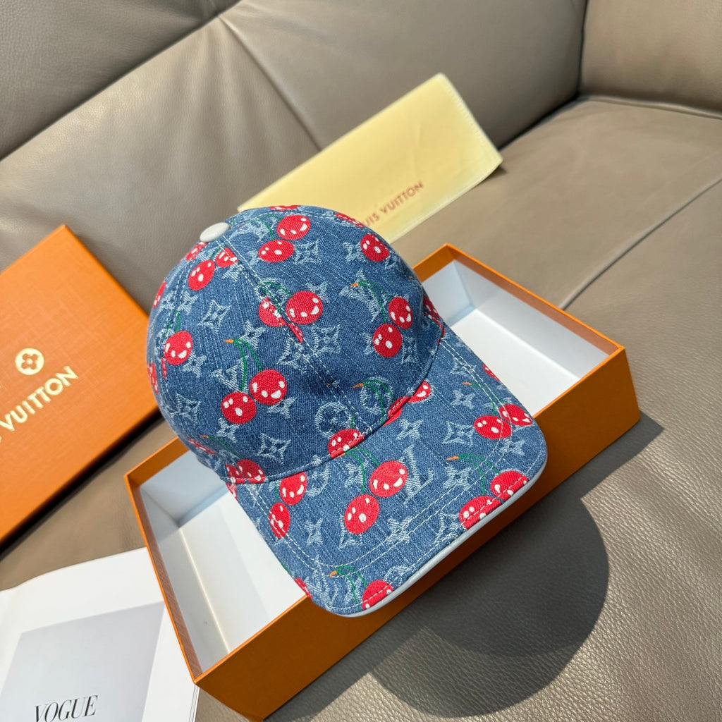 Blue denim baseball cap with red mushroom pattern and curved brim