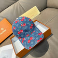 Blue denim baseball cap with red mushroom pattern and curved brim