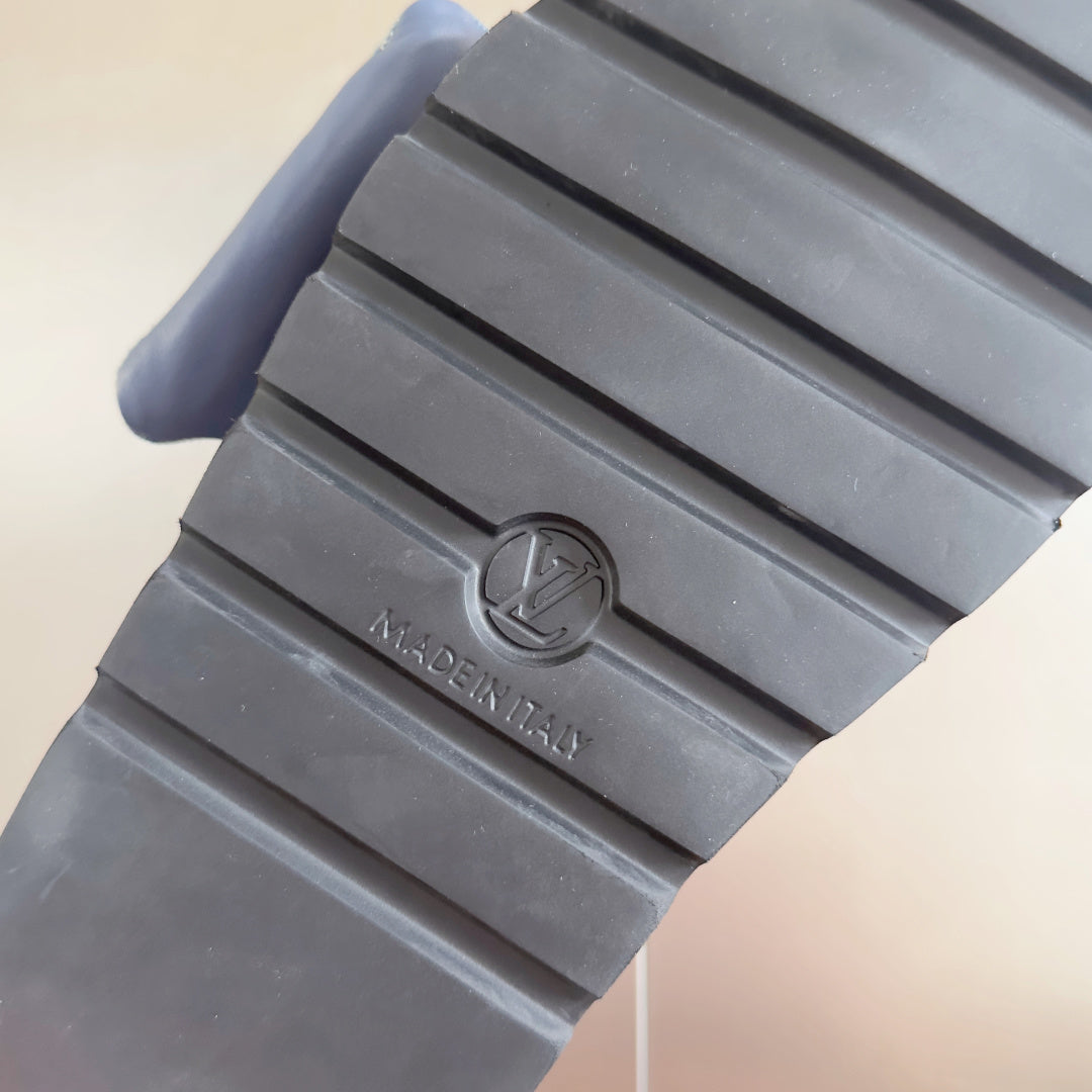 Rubber sandal outsole with Louis Vuitton logo and grooved tread