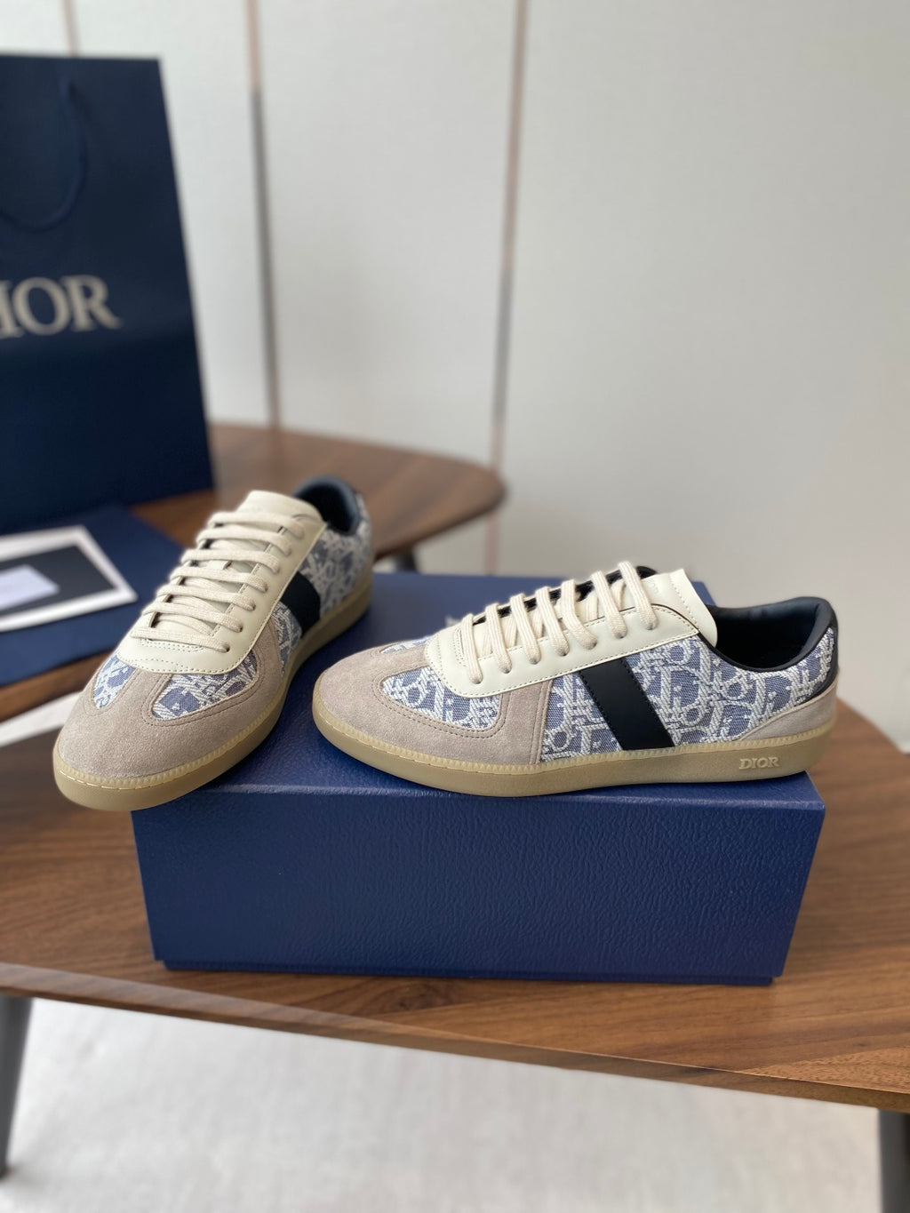 Dior sneakers set on box: cream leather, blue patterned panels, black side strap