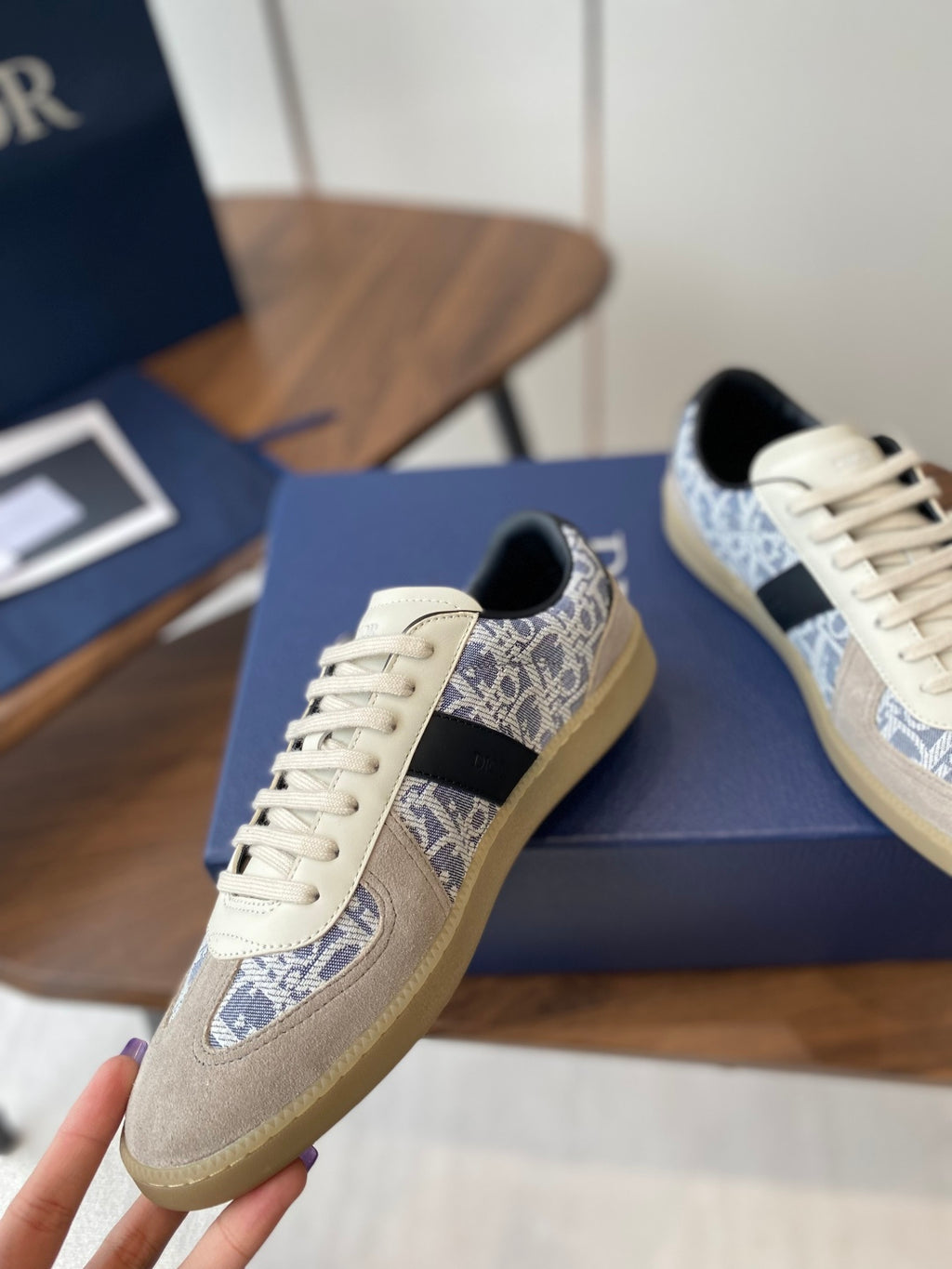 Dior sneaker in cream suede with blue patterned band and white laces
