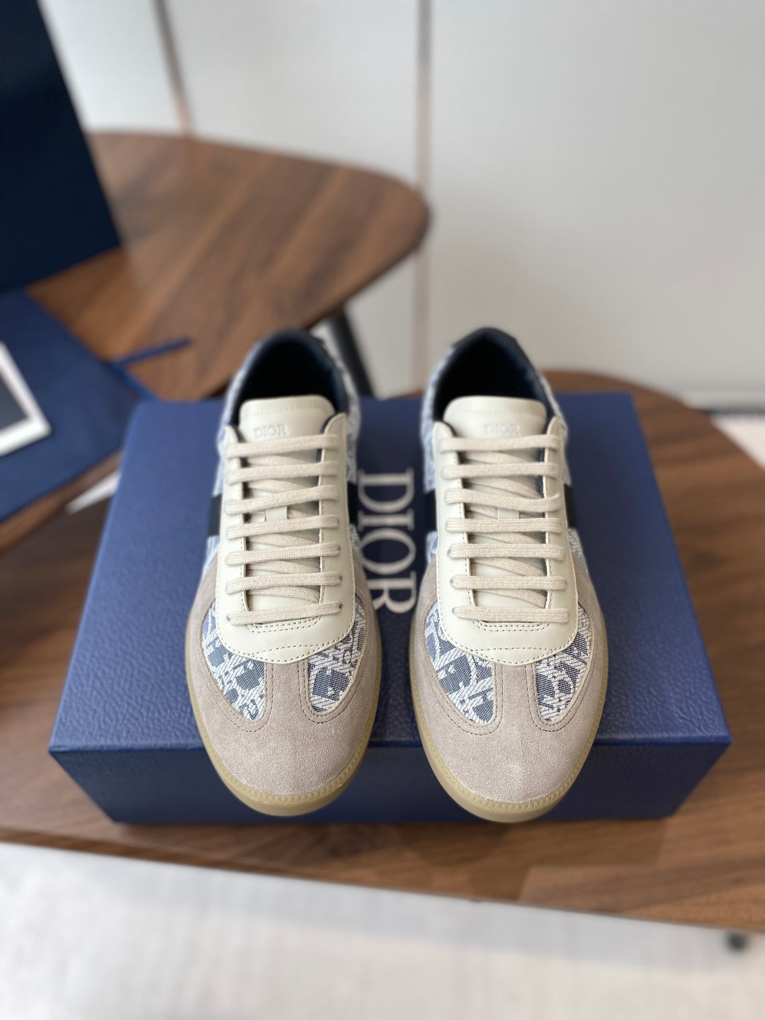 Pair of Dior unisex sneakers in cream suede with blue patterned panels