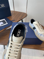 Dior sneaker with cream laces and blue monogram lining, black tongue