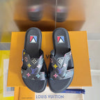 Louis Vuitton slide sandals pair with black straps and multicolor monogram flower print