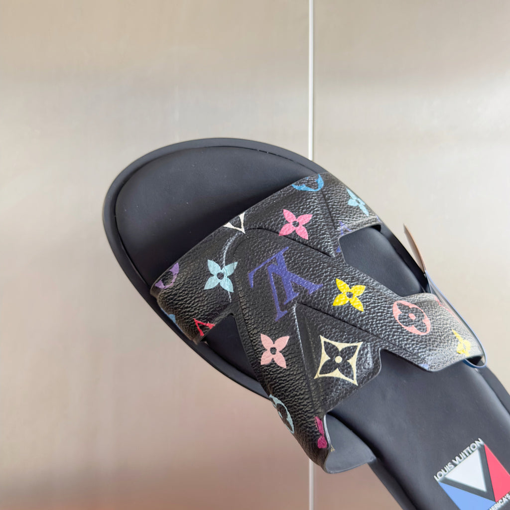 Louis Vuitton slide sandal with black sole and colorful multicolor monogram flower upper
