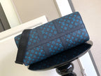Blue monogram duffel bag with front panel and top handles, side view