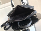 Louis Vuitton bag, dark zip-top tote with open interior and shoulder strap