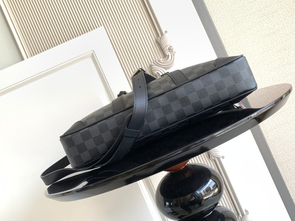 Louis Vuitton checkered duffel bag with long strap and top zipper, dark gray