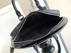 Louis Vuitton checkered bag open top with zipper and dark interior lining, dark gray