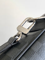 Louis Vuitton bag side hardware ring with metal clasp, dark gray checkered texture
