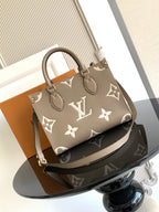 Louis Vuitton bag in gray-beige with monogram print, top handles, and structured shape.