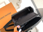 Louis Vuitton crossbody bag with open top and black interior, zipper pull visible