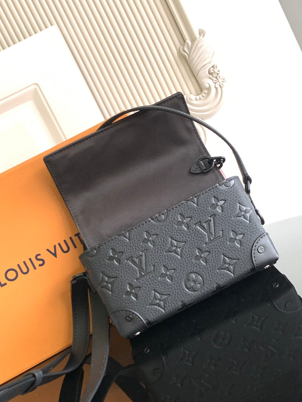 Louis Vuitton monogram crossbody bag in dark gray with smooth top and strap