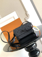 Louis Vuitton monogram crossbody bag in dark gray, front flap and adjustable strap
