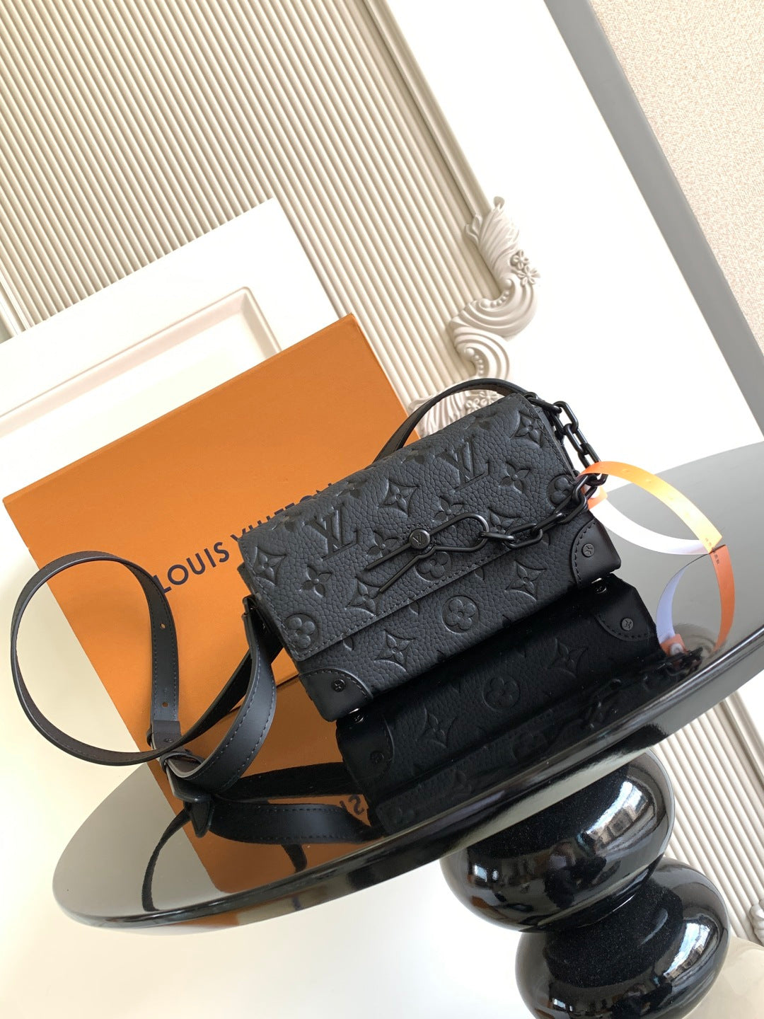 Louis Vuitton monogram crossbody bag in dark gray, front flap and adjustable strap