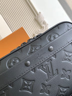 Louis Vuitton monogram crossbody bag front in dark leather with embossed motifs and studs