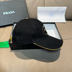 Black baseball cap turned side view with gold-edged brim trim and logo detail.