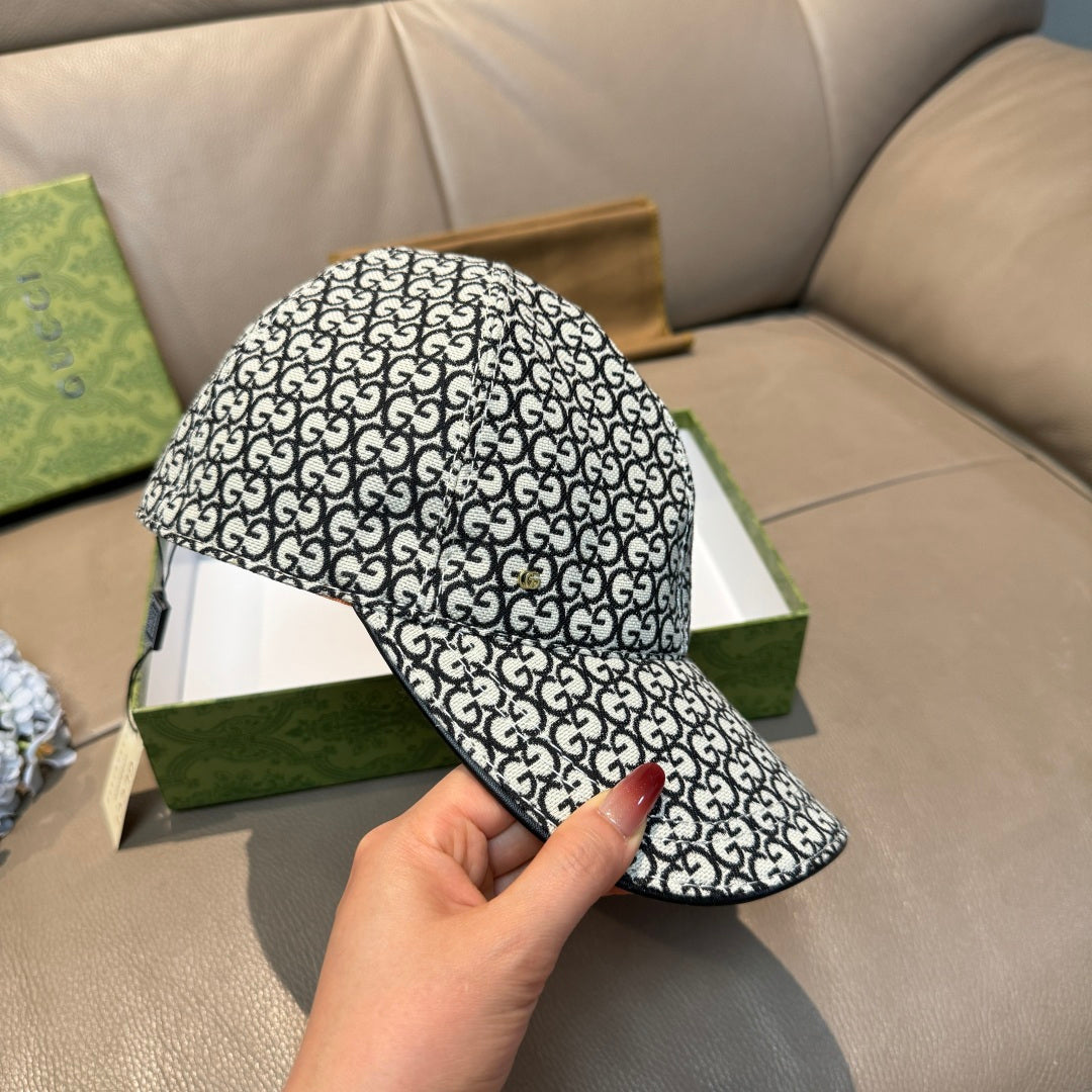 Gucci cap with GG monogram allover pattern, front brim and side crown shown.