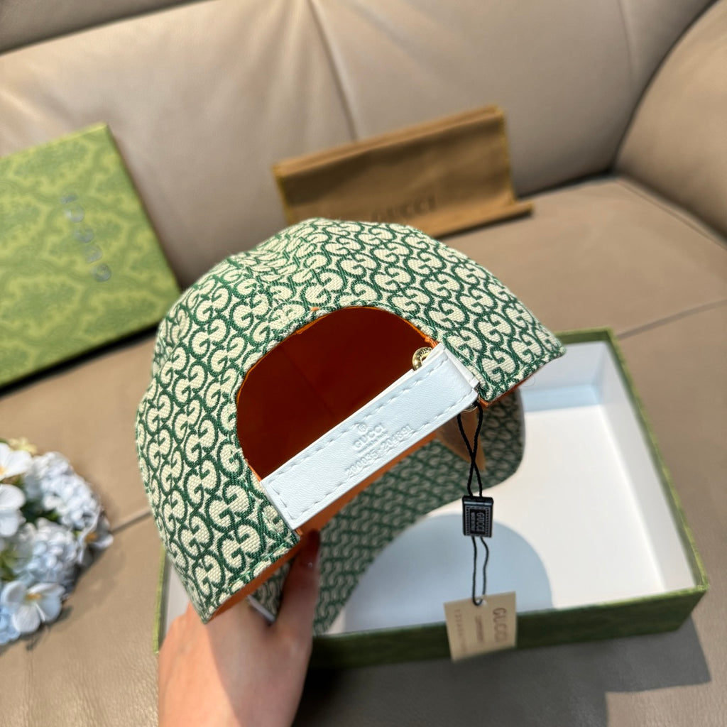 Gucci green GG monogram cap interior view with white label and hanging tag