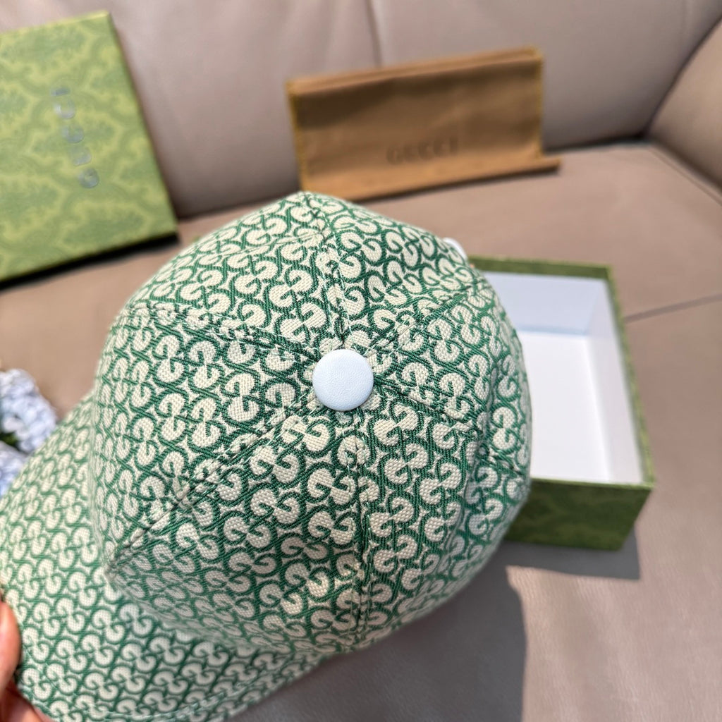 Gucci green GG monogram baseball cap top view with small white button