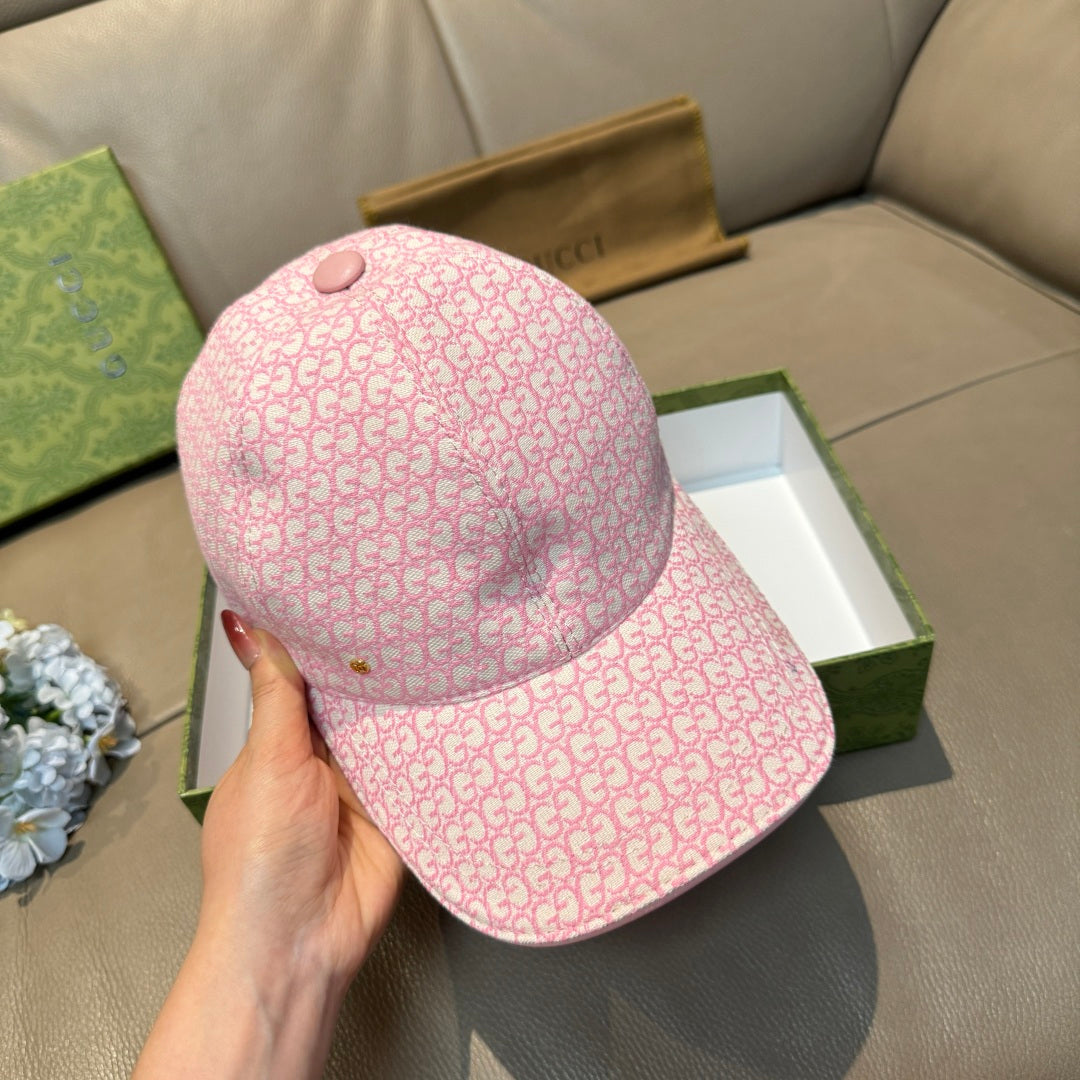 Gucci cap in pink GG monogram print, side view with curved brim