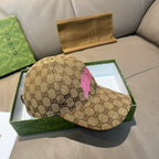 Gucci GG monogram cap with pink logo panel, tan fabric and curved brim