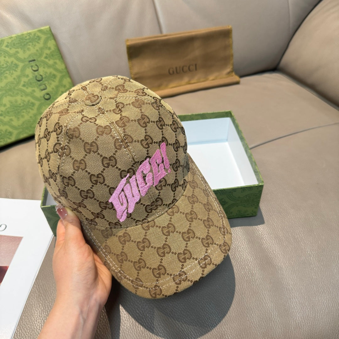 Gucci GG monogram cap with pink lettering, tan baseball style