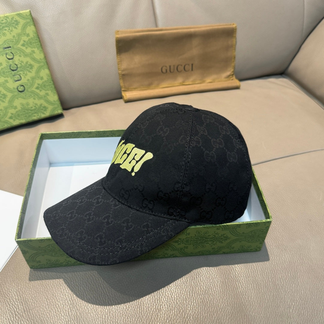 Black Gucci baseball cap with GG monogram, neon logo on side, curved brim.