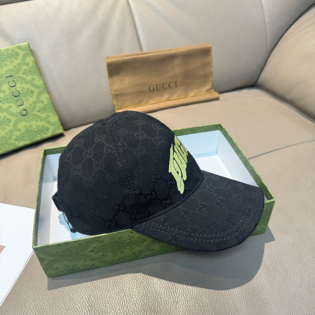 Black Gucci baseball cap with GG monogram, neon logo and curved brim.