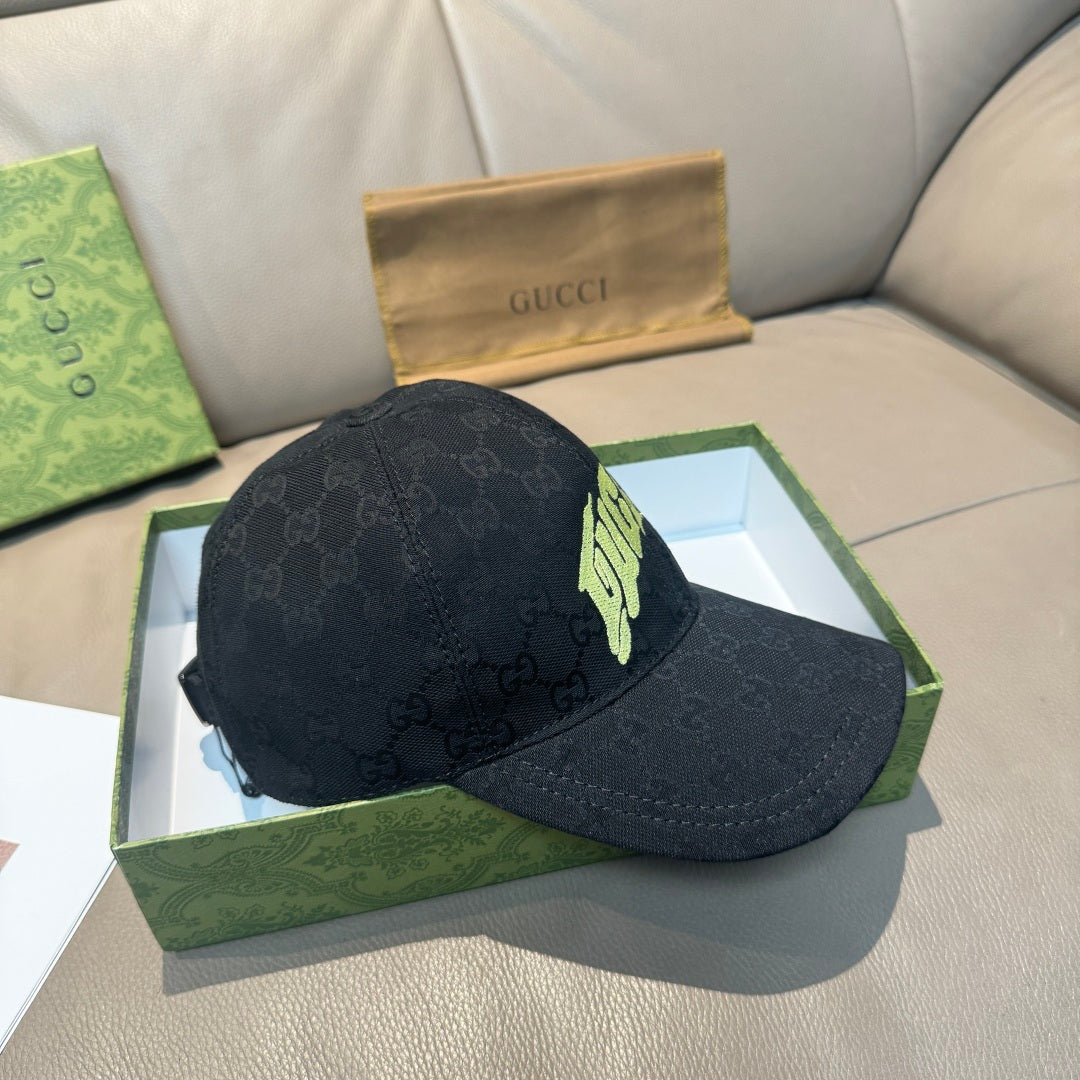 Black Gucci baseball cap with GG monogram, neon logo and curved brim.
