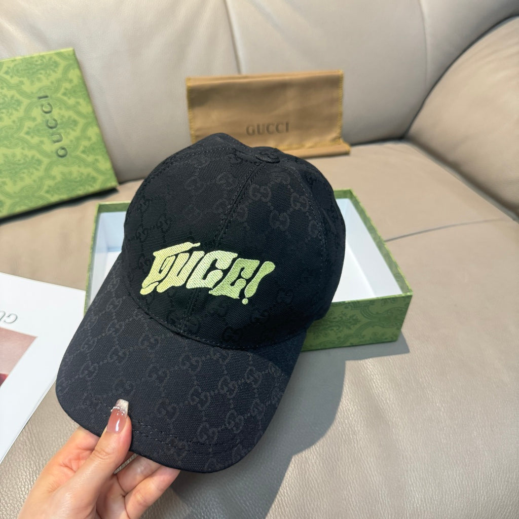 Black Gucci baseball cap with neon logo front and GG monogram allover texture.