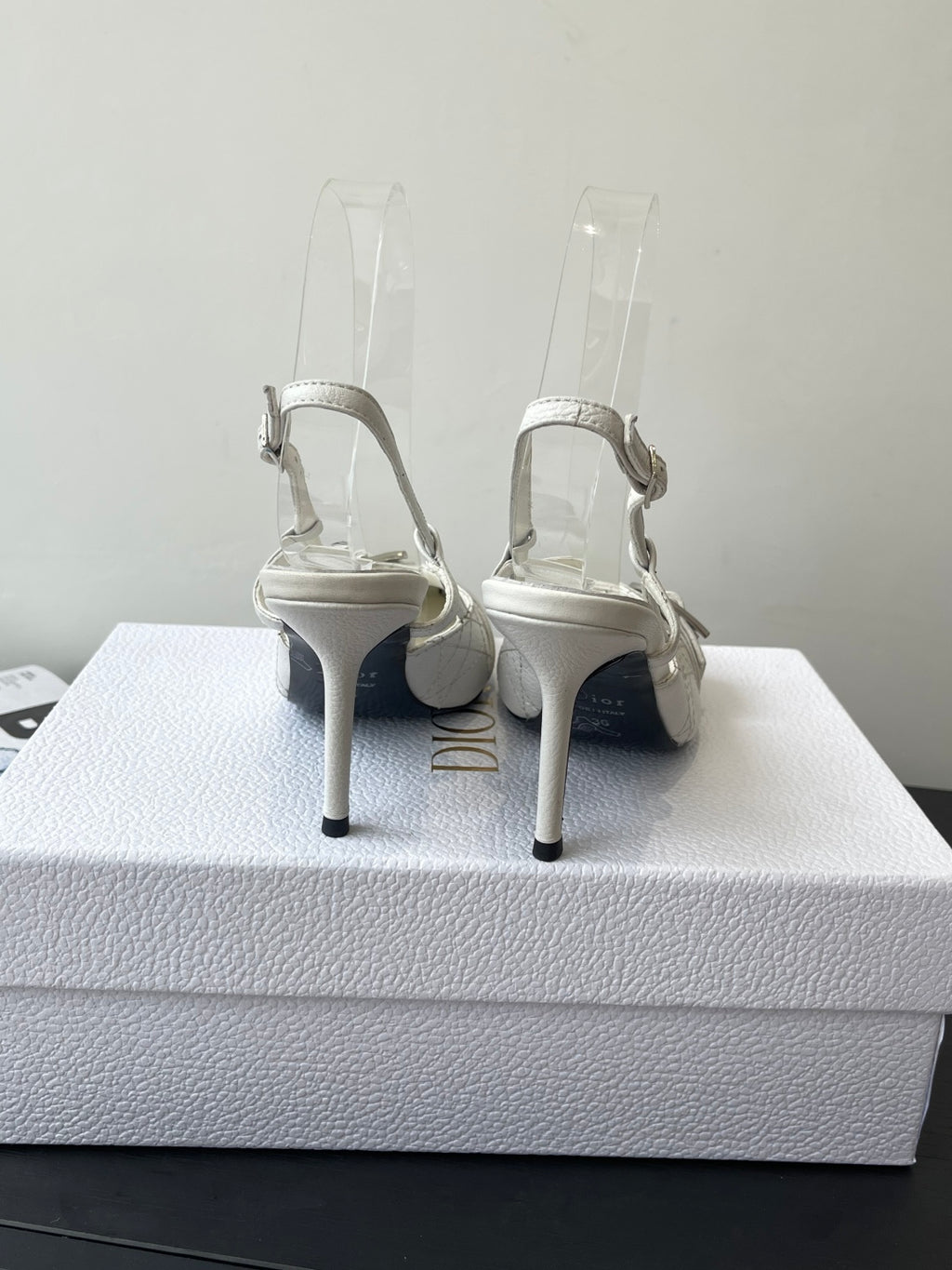 Cream leather women’s slingback heels with stiletto heel and ankle strap