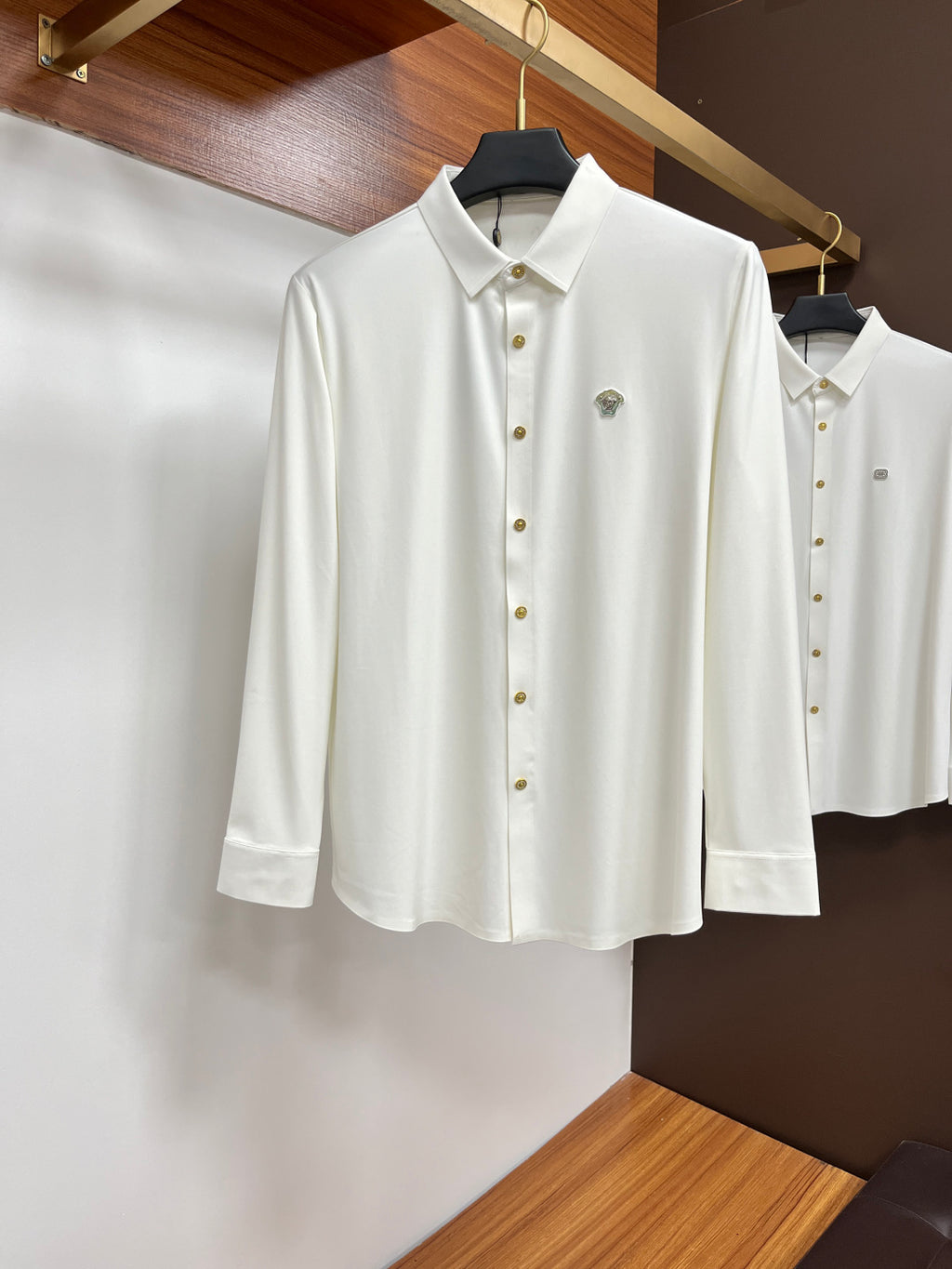 Versace white button-up dress shirt with chest logo and gold buttons