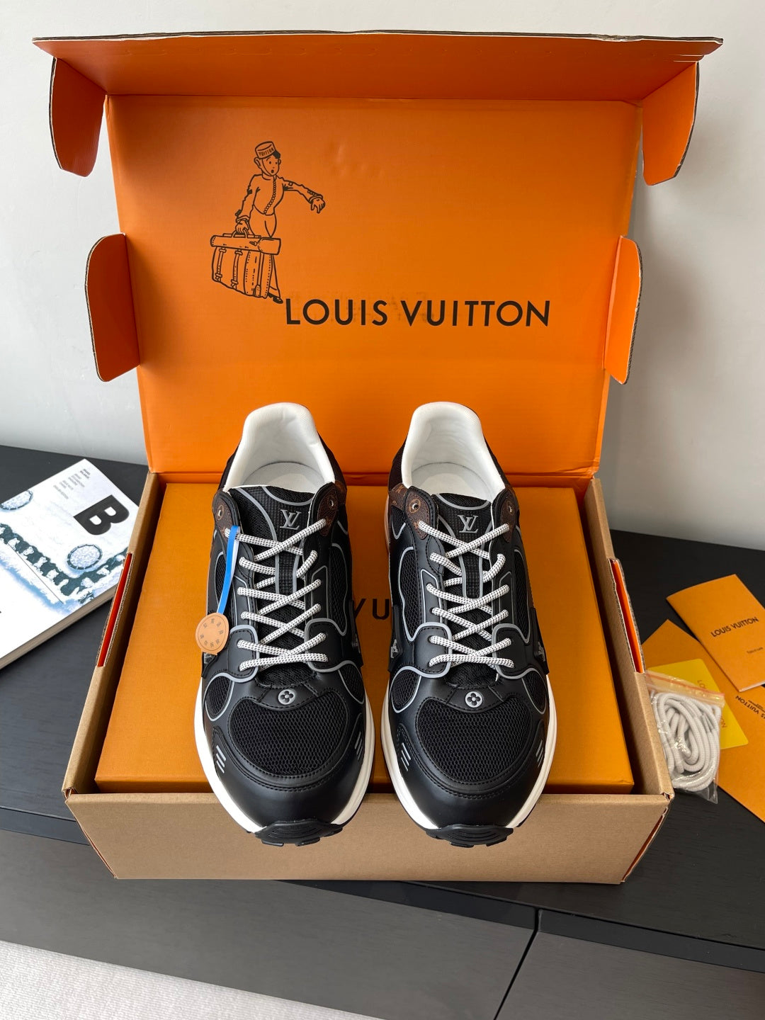 Louis Vuitton ladies lace-up sneakers, black with white laces and cushioned soles