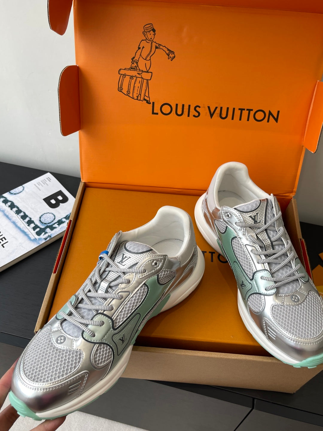 Two silver mesh ladies sneakers in box, mint details and lace-up closure