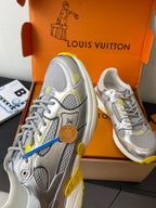 Silver Louis Vuitton sneakers for women, side view with blue lace detail and yellow sole