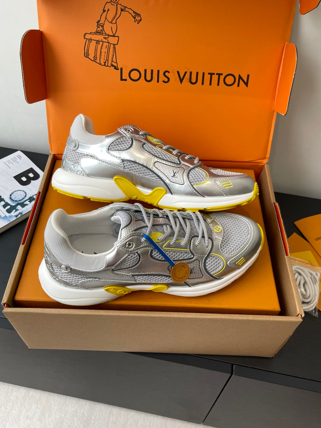 Silver Louis Vuitton sneakers for women, top view with colorful lace and yellow outsole