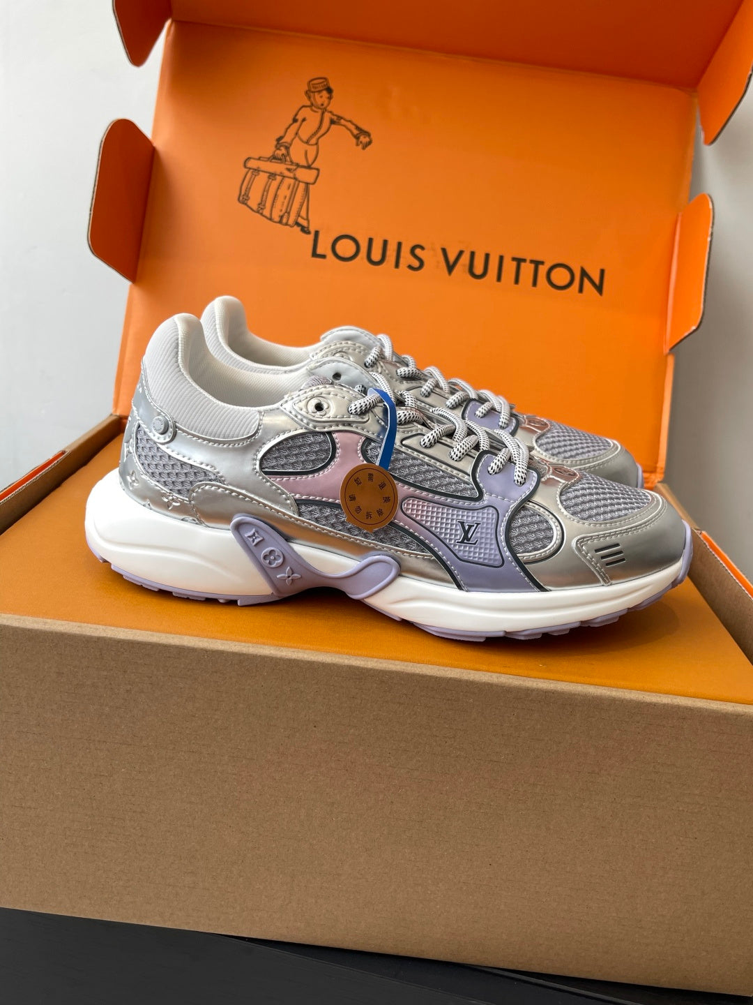 Ladies' luxury sneakers, light gray with multicolor accents and lace-up closure