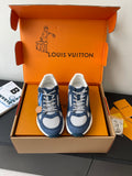 Pair of navy-and-white ladies' sneakers with lace-up front and side panels