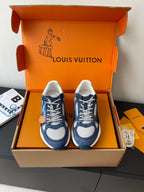 Pair of navy-and-white ladies' sneakers with lace-up front and side panels
