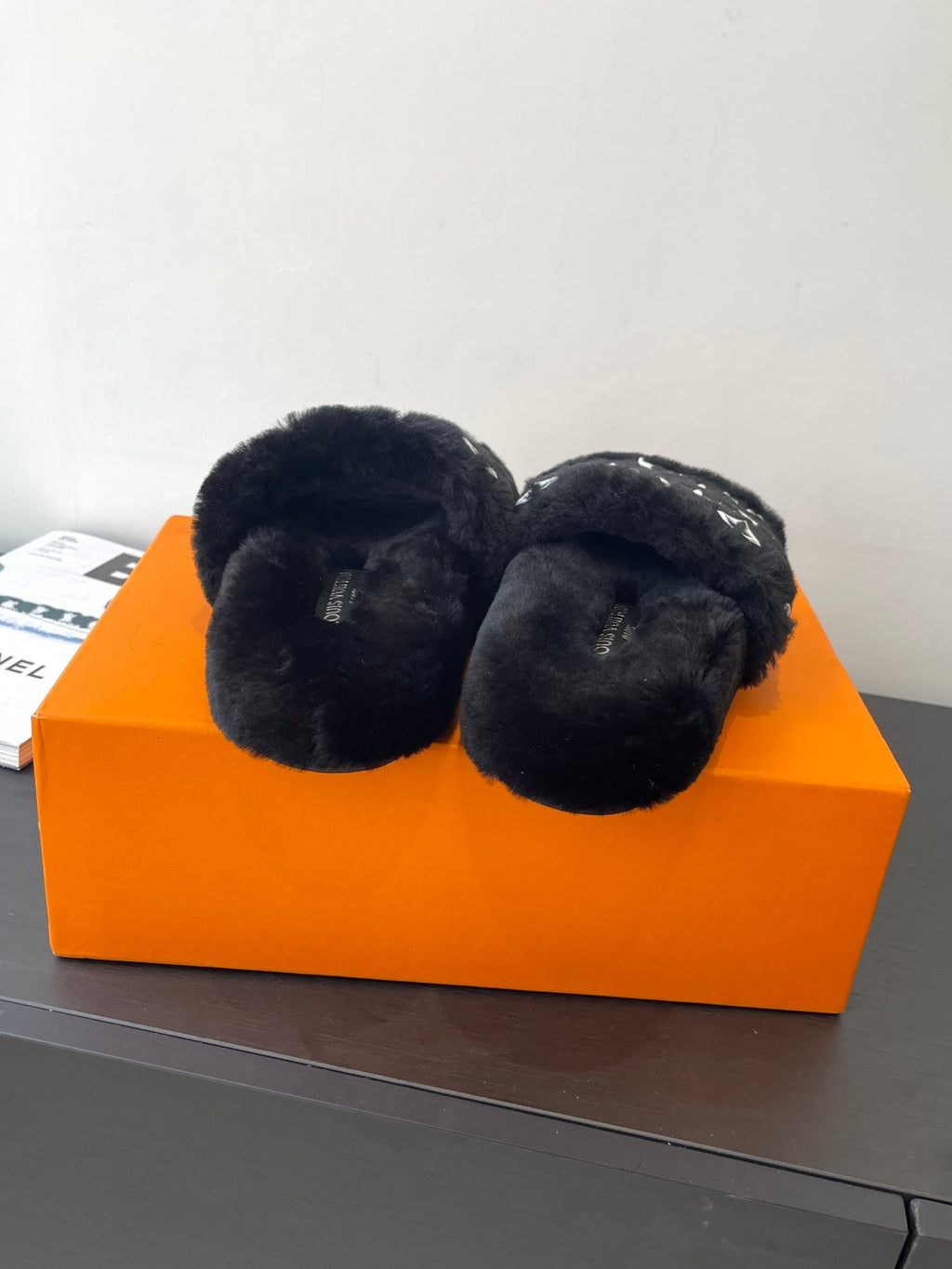 Black plush slide sandals, rounded open-toe mules with smooth footbeds