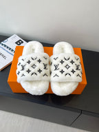 Louis Vuitton women’s plush slides with LV monogram, white faux-fur straps
