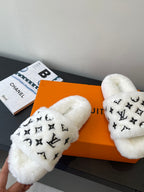 Louis Vuitton women’s plush slide sandals, white faux-fur with LV monogram logos