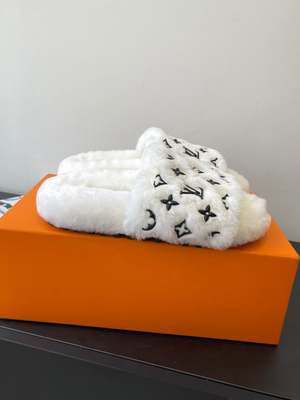 Louis Vuitton women’s plush slide sandals with LV monogram, white fuzzy upper