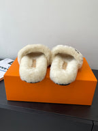 Louis Vuitton plush fur slides, cream cushioned straps and wide open toe